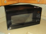 Black G.E. Counter Top Microwave w/ Sensor Cooking and Preset Express Cooking