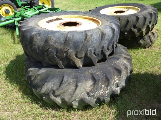 (2) 18.4-38 factory duals on JD 10 bolt wheels