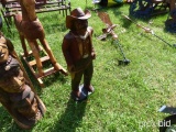 wooden cowboy statue