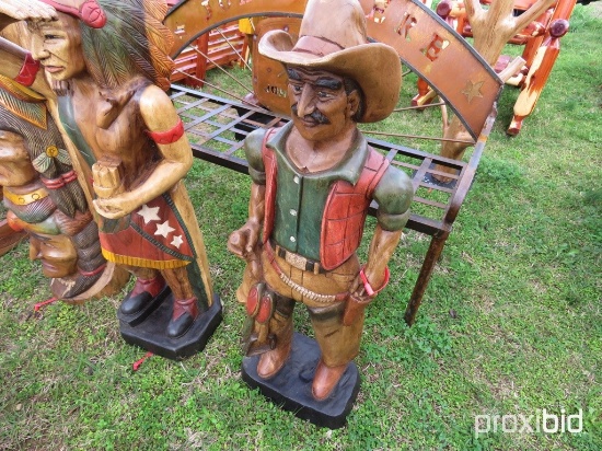 Wood cowboy statue