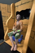 Old Pirate Sitting On Chest with Pistol
