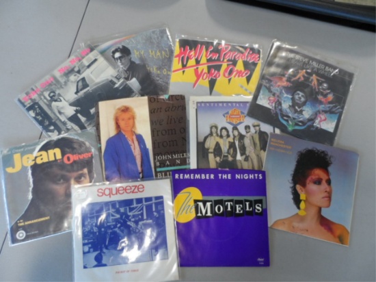 Group of 10 Single Records with Photo Sleeves