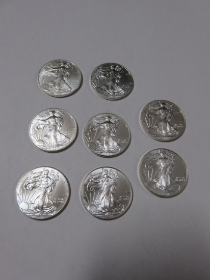 Group of (8) Mixed Date Silver Eagles