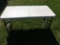 Folding table. 24” wide.