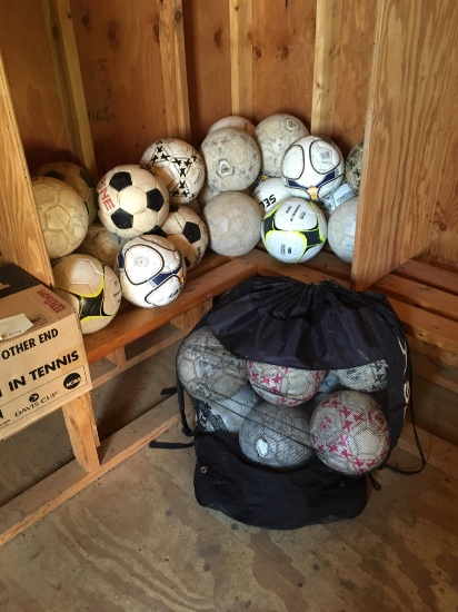 Large group used size five soccer balls. Various
