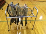 17 vintage tennis rackets and aluminum rack.