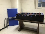 Foosball table and unassembled ping pong