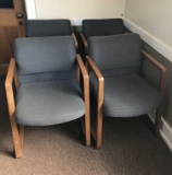 Four office chairs.