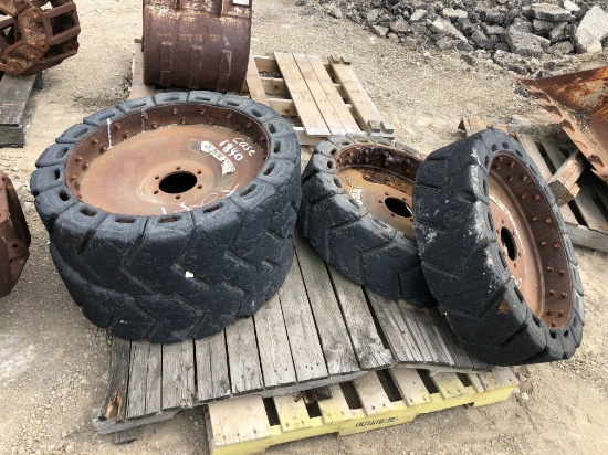 Set of Case Solid Demolition Rubber Tires for a Skid Loader