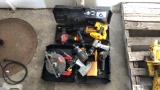 Assorted DeWalt and Milwaukee power tools