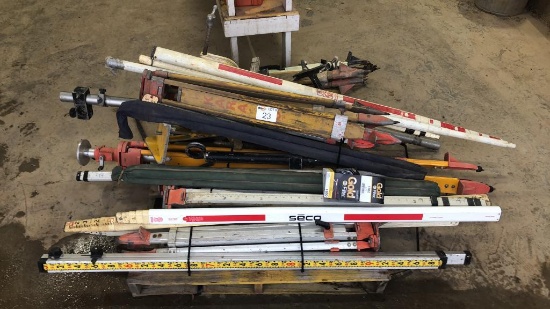 Pallet of Various Laser Stands and surveying poles