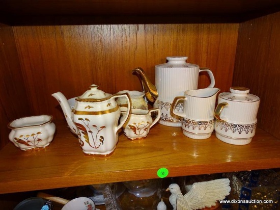 (DR) SHELF LOT OF MISC. GOLD PAINTED ITEMS. INCLUDES A TEA POT 6.5'' TALL, 2 CREAMERS, 2 SUGARS (1