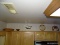 (K) OVER TOP OF CABINETS IN THE MIDDLE, 2 ROMERTOPH BOWLS, SMALL HOMEMADE WOOD BOWL, TWO FISH MOLDS,