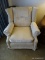 (FR) OFF WHITE EASY CHAIR IN VERY GOOD CONDITION, HAS ARM GUARDS AND ONE PILLOW, 34''L 36''W 36''H