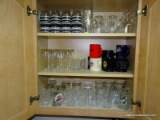 (K) DOUBLE WIDE CABINET FILLED W/ MISC. GLASSWARE, BATMAN GLASSES, MICKEY MOUSE GLASSES, RONALD