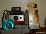 (FBB) POLAROID LAND CAMERA W/ FLASH AND REPLACEMENT BULBS