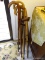 ALL CANES INSIDE OF UMBRELLA STAND. INCLUDES MOSTLY WOODEN BUT 1 IS AN ADJUSTABLE STAINLESS CANE.