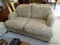 AMERICAN HOME COLLECTION FLORAL UPHOLSTERED LOVE SEAT. 61''X39''X33'' IS IN EXCELLENT CONDITION