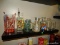 CONTENTS ON SHELF: MISC. CANISTERS. PAINTED OIL AND VINEGAR BOTTLES. ETC.