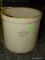 2 GAL. GLAZED CROCK WITH A CROWN MARKING. IS IN VERY GOOD CONDITION WITH NO SIGHTED DAMAGE. 9.75''