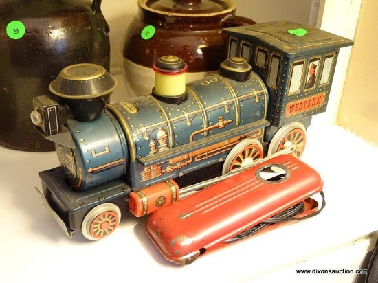 METAL WESTERN ELECTRIC TOY LOCOMOTIVE IS IN VERY GOOD CONDITION 13''X5''X5.75'' INCLUDES A SMALL CAR