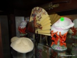 CONTENTS OF TOP SHELF: SAND DOLLAR: EGYPTIAN SCARAB. ORIENTAL FAN ON STAND. PAIR OF UNUSUAL SHELL