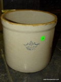 2 GAL. GLAZED CROCK WITH A CROWN MARKING. IS IN VERY GOOD CONDITION WITH NO SIGHTED DAMAGE. 9.75''