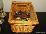 BASKET FULL OF MISC. NAPKIN RINGS. SOME SILVER-PLATE, SOME PEWTER, SOME DECORATOR.