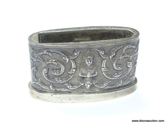 .925 STERLING SILVER ANTIQUE SIAM NAPKIN HOLDER, DEPICTS ELEPHANTS IN HAUT RELIEF. MEASURES APPROX.