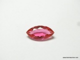 9.14 CT MARQUIS CUT RED TOPAZ. MEASURES APPROX. 21 BY 10 BY 6MM.