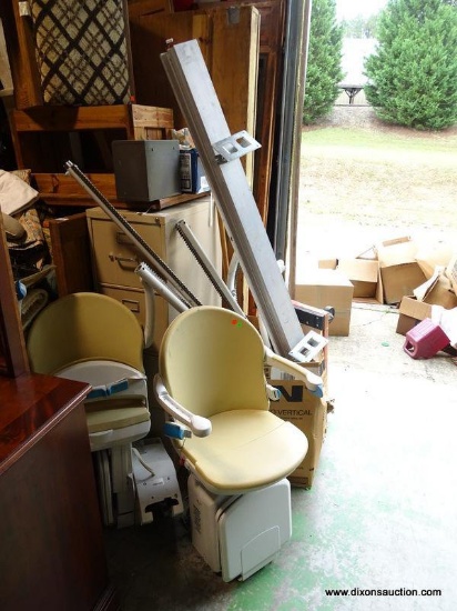 (W1) PAIR OF HANDICARE UK LTD STAIRLIFT CHAIRS (2015). SERIAL MO7152110. HAS RAILING FOR CHAIRLIFTS.