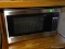 (K) PANASONIC STAINLESS STEEL MICROWAVE. MODEL NO. NN-SA6515. IN GOOD WORKING CONDITION