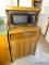 (K) ROLLING MICROWAVE CART WITH CONTENTS (DOES NOT INCLUDE MICROWAVE). 25''X21''X48.25''