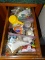 (K) BOTTOM CORNER CABINET AND DRAWER. INCLUDES PLASTIC WARE, WATER PITCHERS, MEASURING CUPS,
