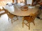 (K) KITCHEN TABLE WITH 2 BOARDS. 72''X47.5''X30'' WITH BOARDS IN. EACH BOARD IS 12'' WIDE. TABLE