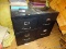 (A) 2 LARGE LEGAL SIZE BLACK FILE CABINETS. BOTH ARE 2 DRAWER. 18''X28''X29''