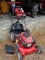 (G) TROY BUILT 21'' PUSH MOWER. CURRENTLY NOT RUNNING BUT IS FULL OF GAS. NO FIRE.