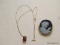 (LR) 14K GOLD JASPER WARE CAMEO 1.'' LONG AND INCLUDES A 14K GOLD CHAIN WITH A GARNET PENDANT.