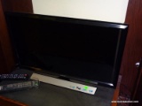 (LR) SAMSUNG LED TV. MODEL T24E31OND. DATED 2016. INCLUDES REMOTE CONTROL