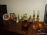 (LR) LOT ON TOP OF ENTERTAINMENT CENTER. INCLUDES A PAIR OF RESIN DOG BOOK ENDS, A BEAR MUSIC BOX,