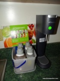 (K) COUNTER TOP. INCLUDES A SODA STREAM MACHINE WITH A SODA MIXED TASTE SAMPLER PACK