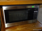 (K) PANASONIC STAINLESS STEEL MICROWAVE. MODEL NO. NN-SA6515. IN GOOD WORKING CONDITION