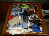 (K) CABINET 7. INCLUDES FRYING PANS, A WAFFLE IRON, ETC. DRAWER OVER TOP ALSO INCLUDED. HAS FORKS,