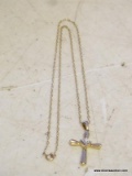 (LR) 14K YELLOW GOLD CROSS WITH DIAMONDS ON CHAIN. CHAIN IS 17'' LONG. TOTAL WEIGHT IS 2.18 DWT