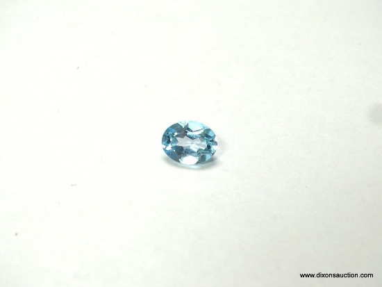 2.07 CT. OVAL CUT BLUE TOPAZ, 9 BY 7 BY 4MM.