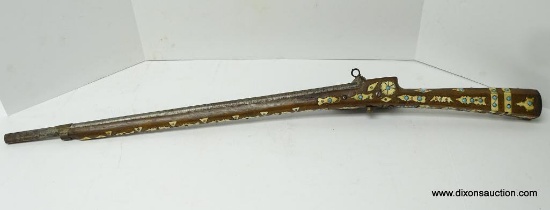 (SC) AFRICAN/ OTTOMAN EMPIRE FLINTLOCK TRAPPER'S RIFLE. STOCK IS INLAID WITH IVORY AND SET WITH RUBY