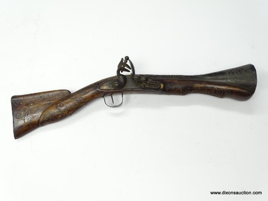 (SC) ANTIQUE FLINTLOCK BLUNDERBUSS INLAID WITH BRASS IN THE STOCK. 22" LONG. MOUTH OF THE BARREL IS