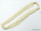 20-22'' PRE OWNED LIKE NEW 10 STRAND FRESHWATER SEED PEARL NECKLACE GOLD TONE CLASP (RETAIL $175.00)