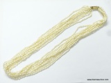 20-22'' PRE OWNED LIKE NEW 10 STRAND FRESHWATER SEED PEARL NECKLACE GOLD TONE CLASP (RETAIL $175.00)