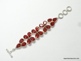 .925 STERLING SILVER 7-8'' FACETED PEAR SHAPE RUBELLITE GORGEOUS BRACELET (RETAIL $175.00)